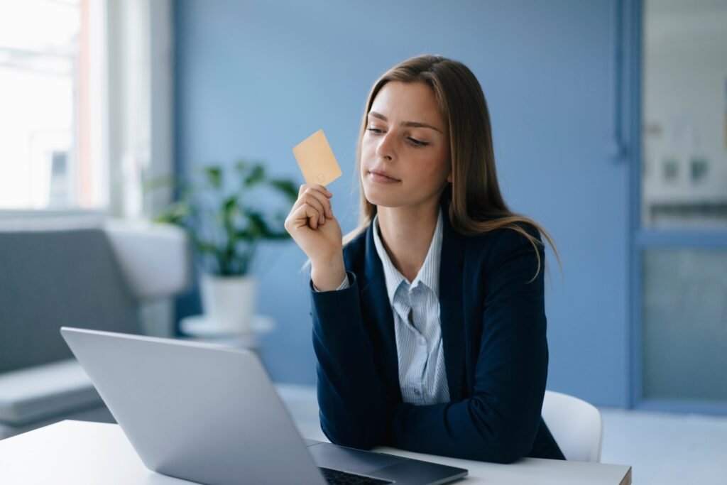 Young businesswoman doing online payment with her credit card