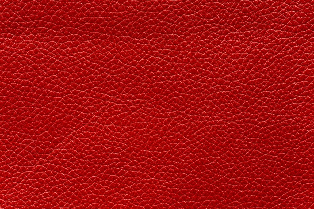 Texture of red cow leather for abstract background.