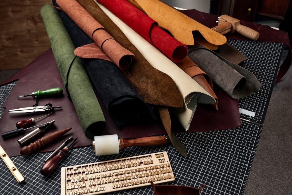 Tools for leather crafting and pieces of eather. Manufacture of leather goods.