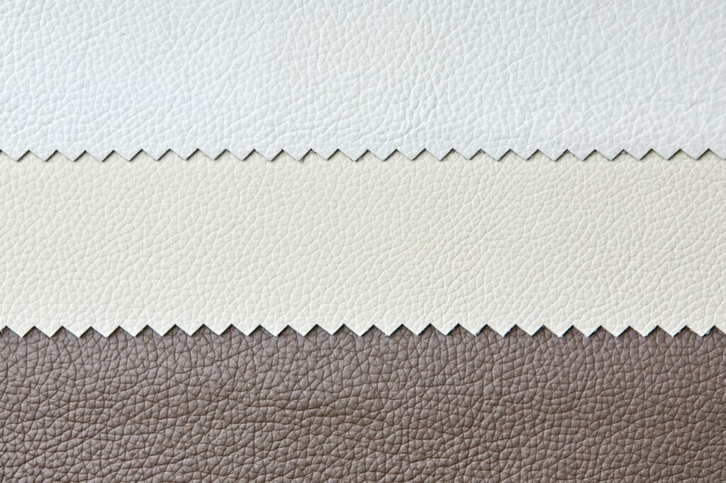 Different colors natural leather textures samples in light grey ,brown and beige tone color, for